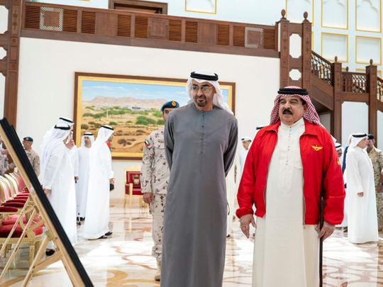 His Highness Sheikh Mohamed bin Zayed Al Nahyan, President of the United Arab Emirates with King Hamad bin Isa Al Khalifa look at photographs upon arriving at Sakhir Air Base, Bahrain. 